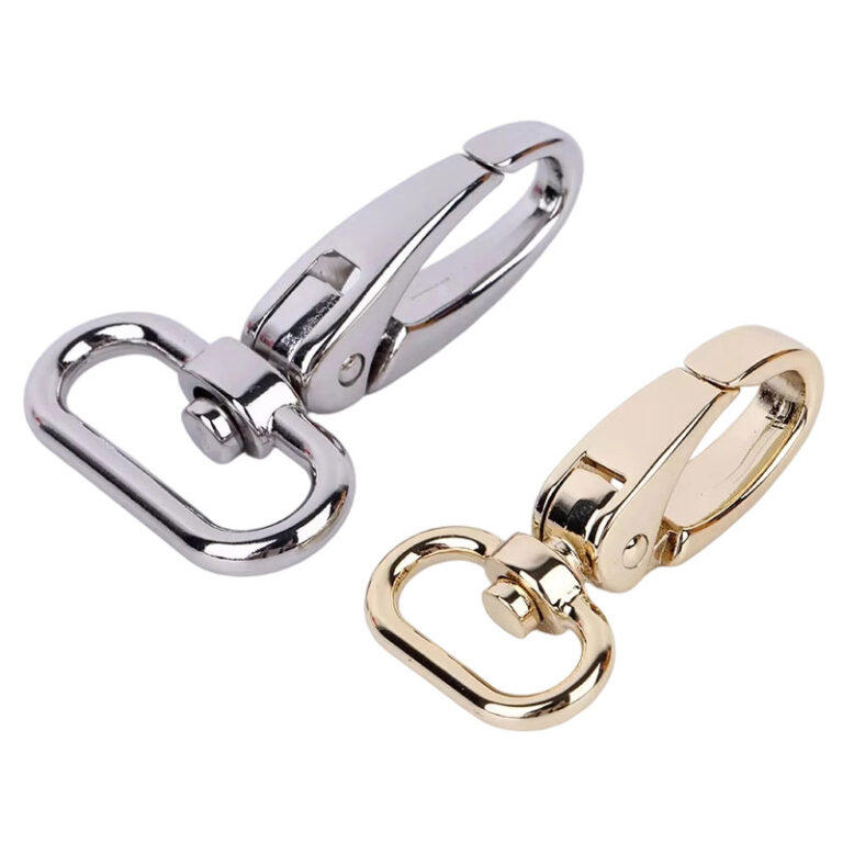 Chrome and gold metal swivel snap hook detail view