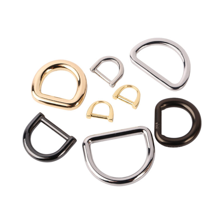 Assorted metal D-ring buckles in rainbow, rose gold, and gunmetal options.