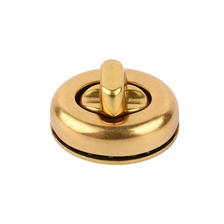Gold finish customized handbag lock made of zinc alloy or brass for high-end women’s handbag hardware.
