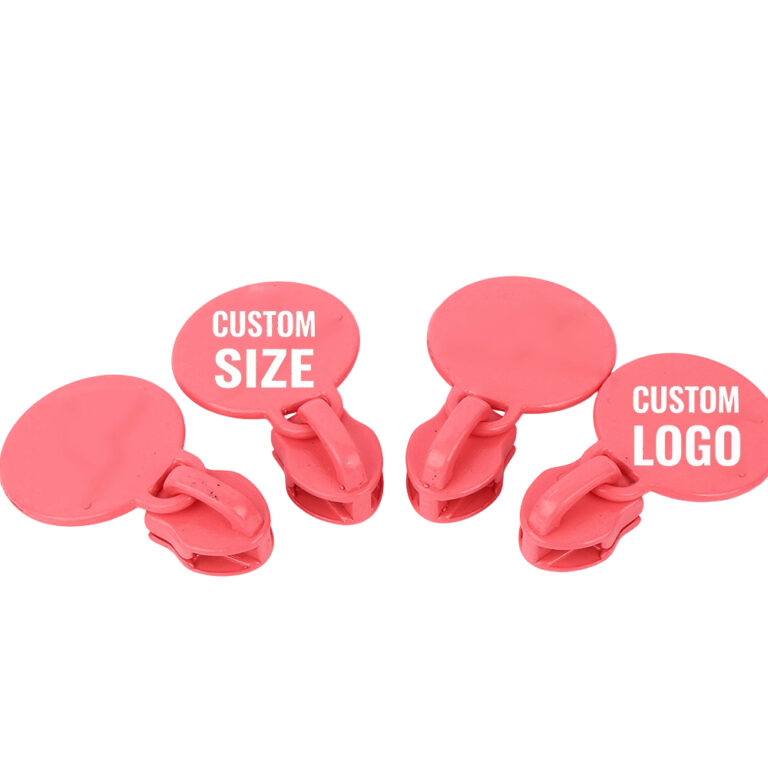 A set of pink multi-shape custom logo zipper pullers for hardware sampling