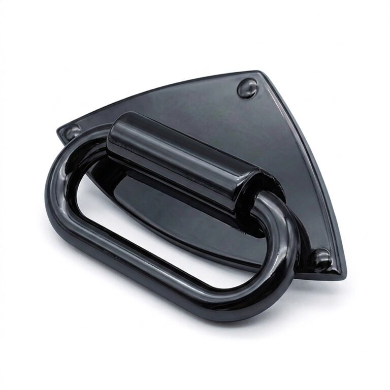High-gloss black metal bag pull handle with triangle base for luxury handbags.