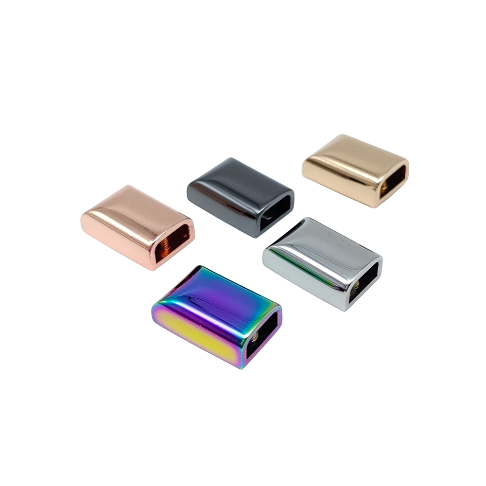Luxury metal zipper tail finishers available in rainbow gunmetal and gold plating for designer bags.