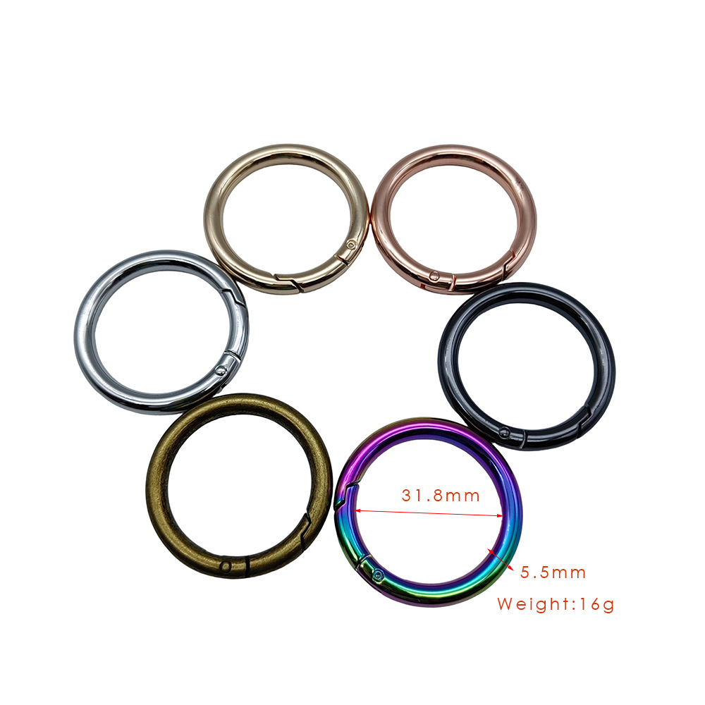 A multi-color collection of wholesale 32mm zinc alloy O-ring clasps with dimensional specs by DG Buddy.