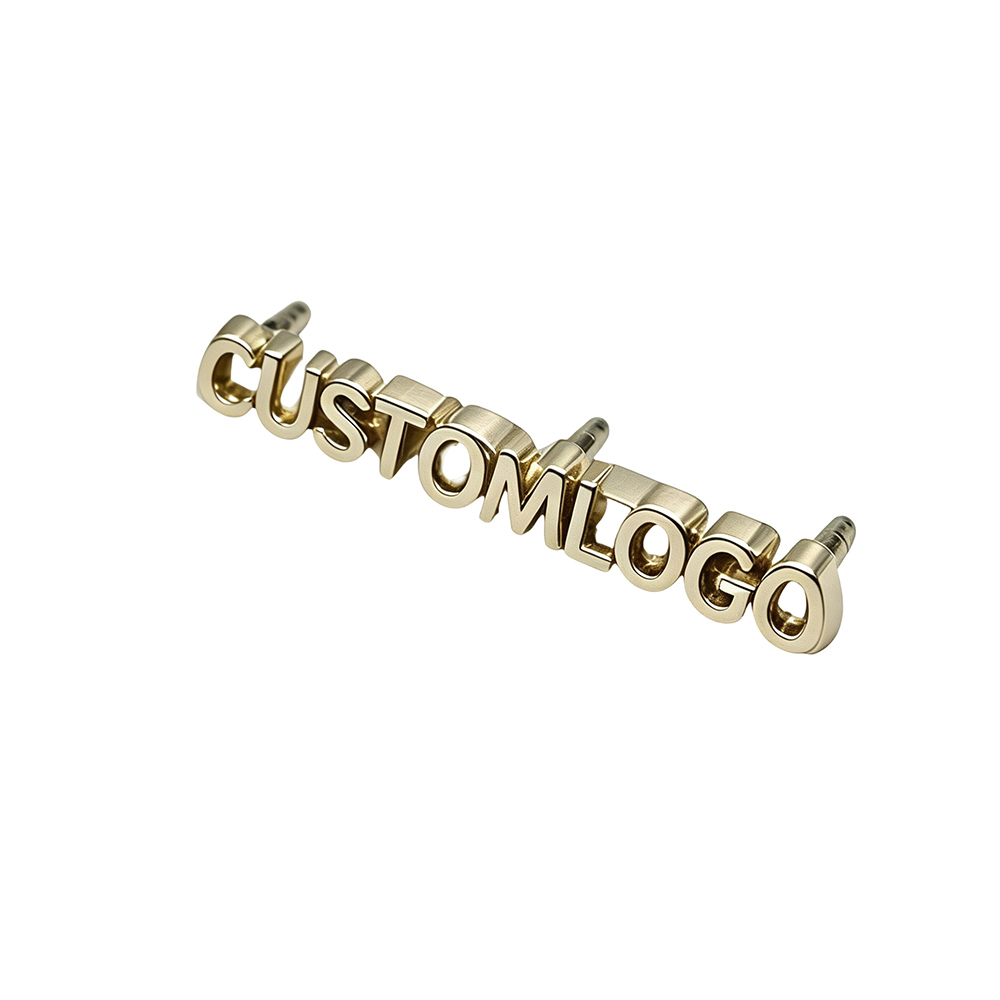 Custom metal logo plate for handbags with custom brand text.