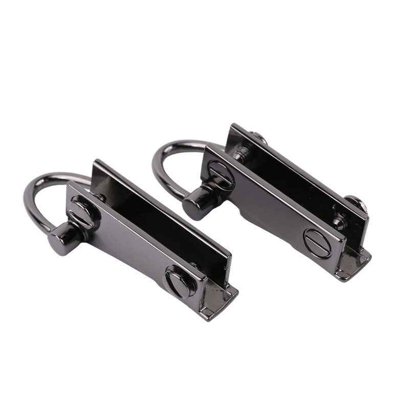 Heavy duty gunmetal handbag edge connectors and screw on purse strap anchors for luxury bags.