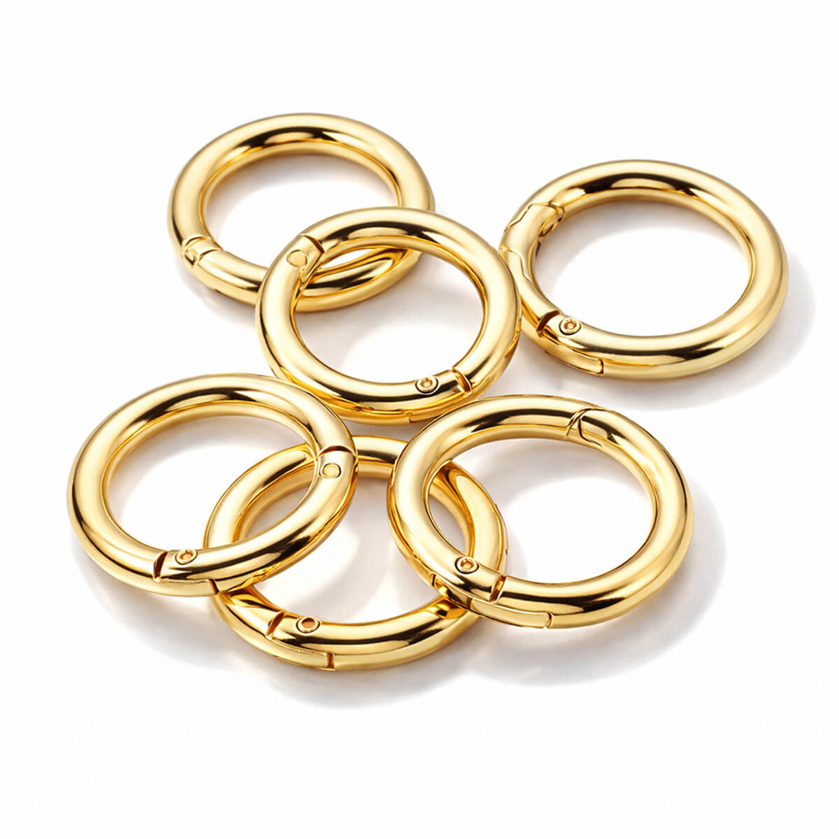Bright light gold zinc alloy snap ring set for luxury handbag making hardware.