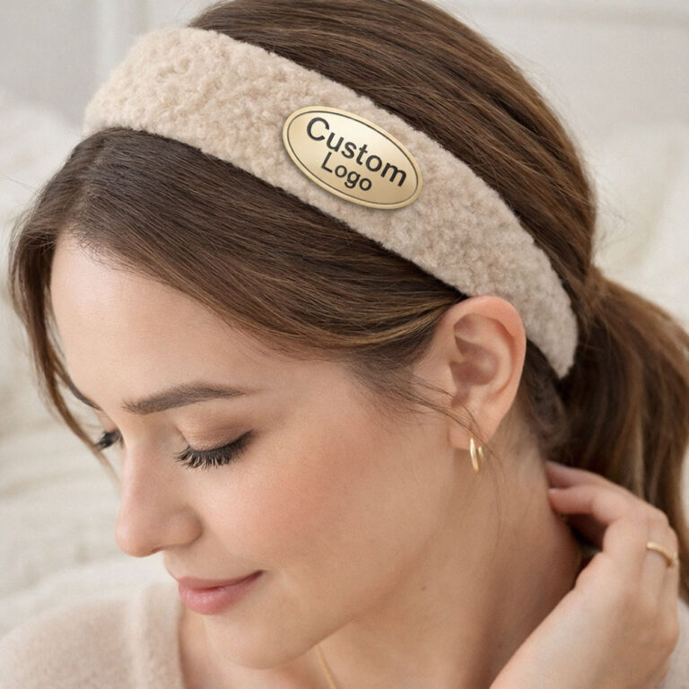 DG Buddy metal hardware manufacturer showcasing premium zinc alloy die casting hardware plates on a dark grey plush headband.