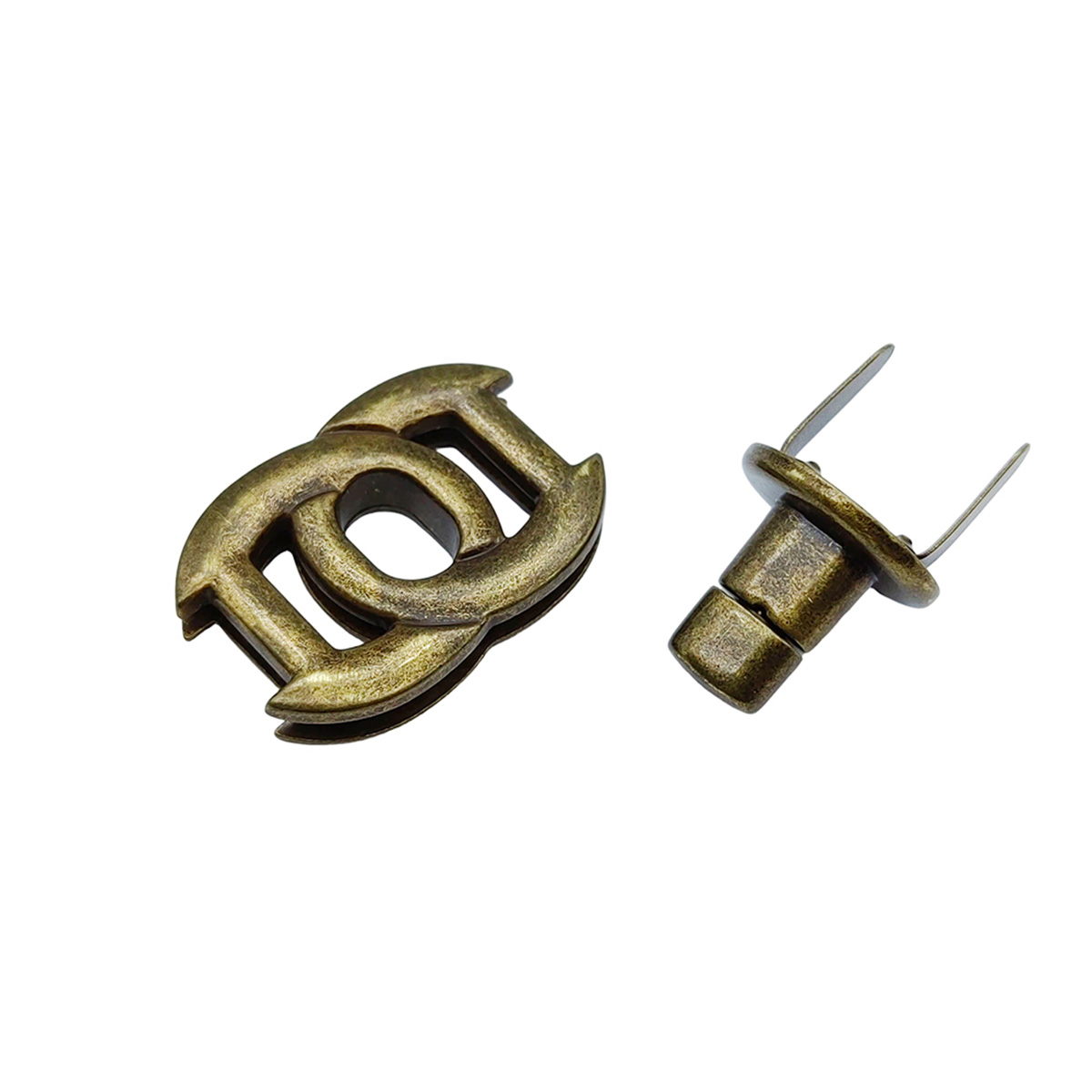 Side angle view of premium purse turn lock hardware from a wholesale manufacturing supplier.