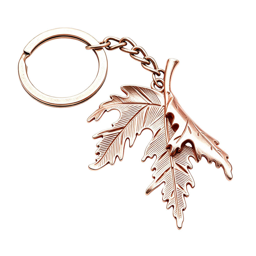 Rose gold custom leaf metal keychain produced by zinc alloy die casting process.