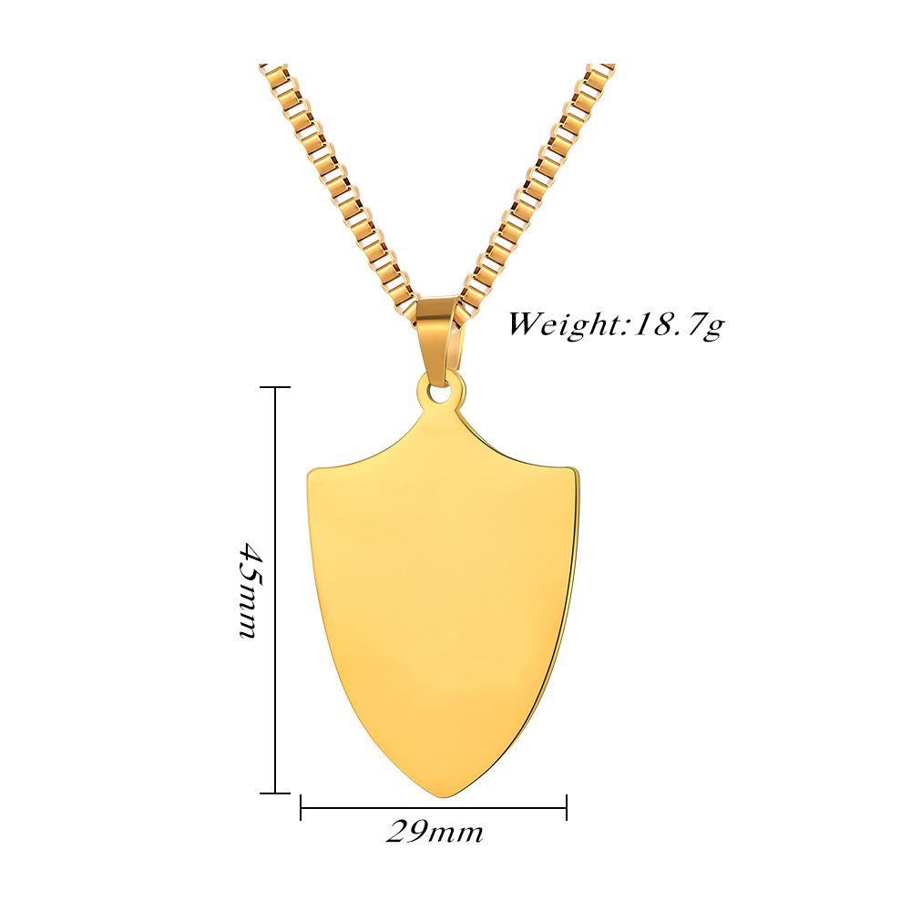 A light gold shield pendant necklace showing professional technical dimensions, 45mm by 29mm, weight 18.7g.