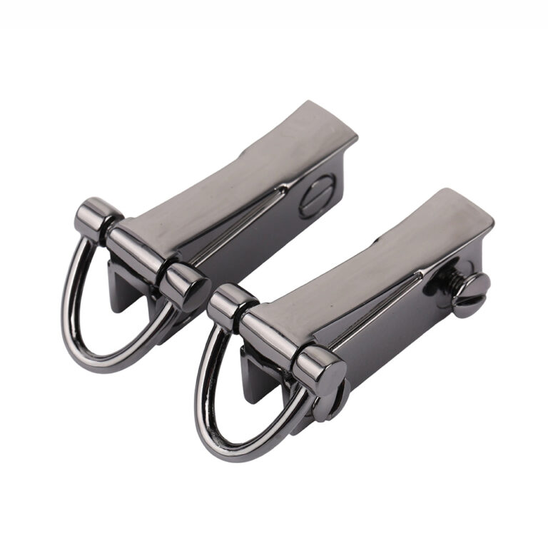 Heavy duty gunmetal handbag edge connectors and screw on purse strap anchors for luxury bags.