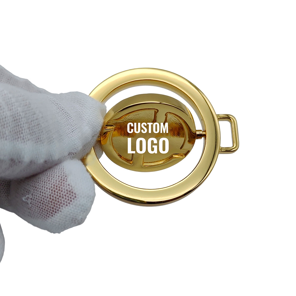 Close-up of a 360 degree swivel logo hardware mechanism being rotated to show the laser engraved custom brand logo plate.