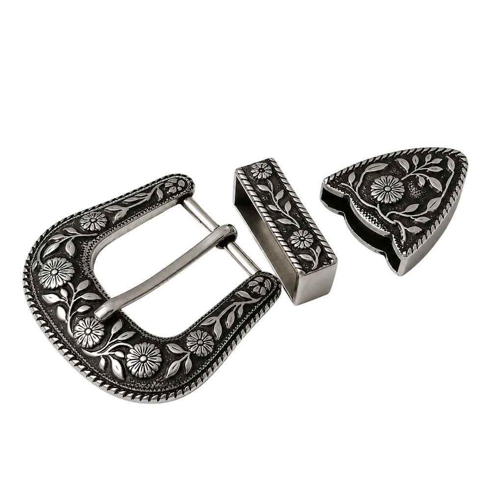 OEM leather belt hardware supplier showing engraved metal hardware and pin buckle components.