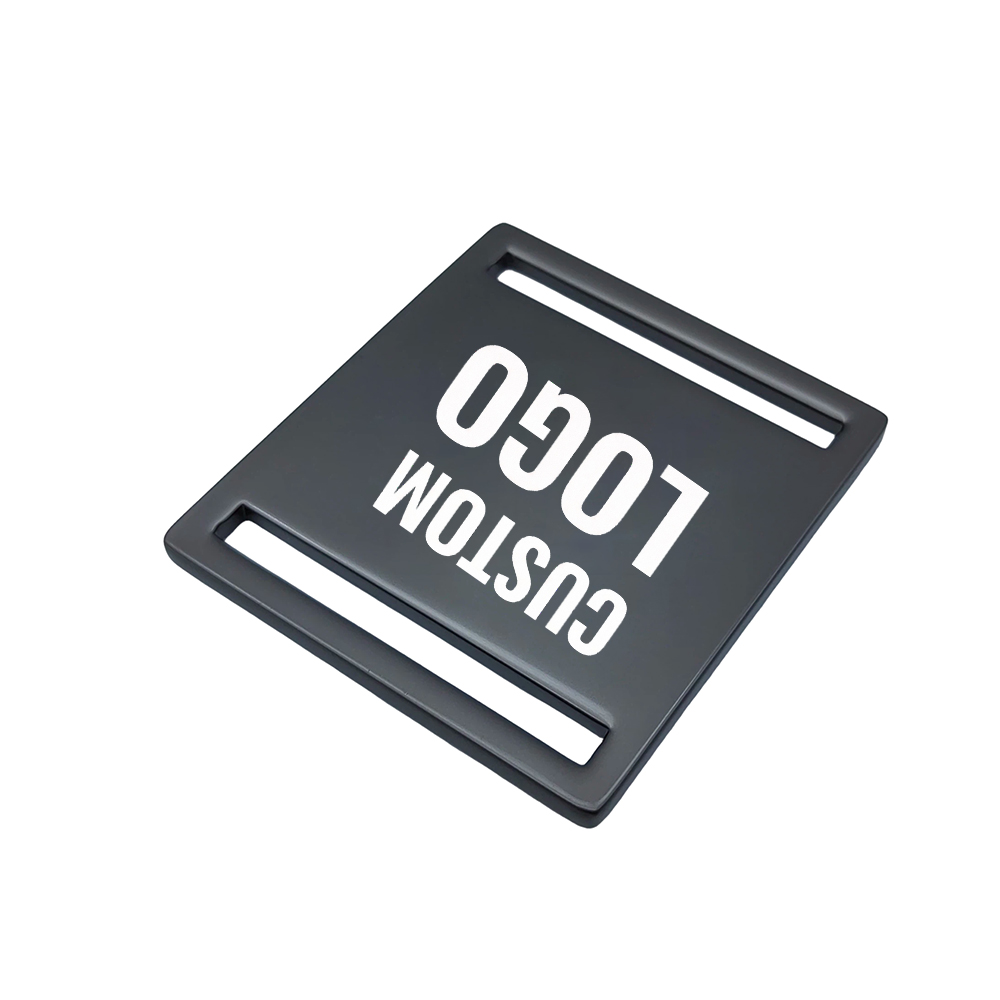 Brass die casting hardware logo plate with raised letter details.
