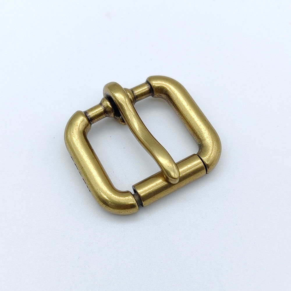 Custom antique brass roller buckle for bags and premium leather craft projects.