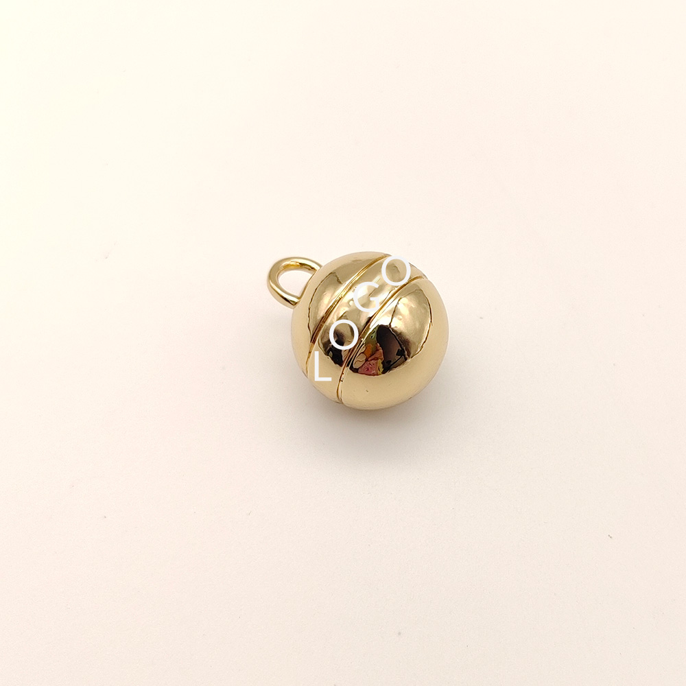 Custom gold ball pendant for handbags and DIY keychain accessory crafting.
