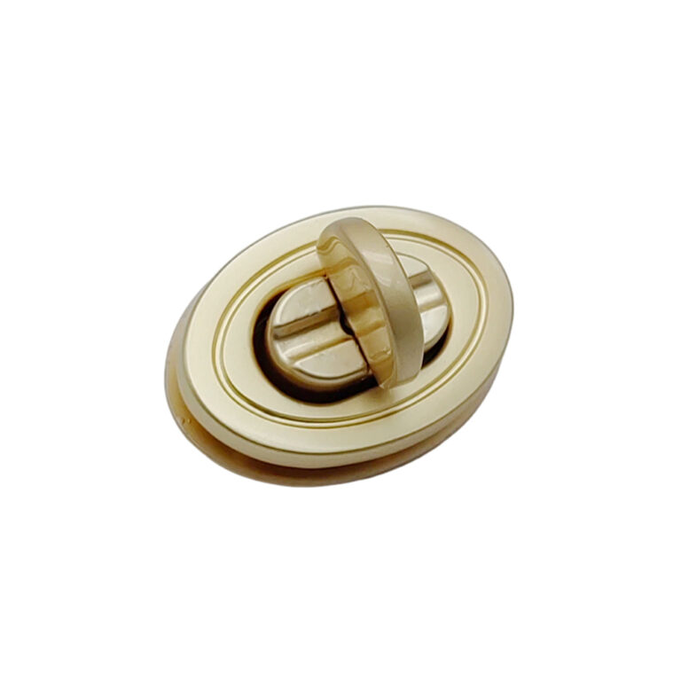 Assembled oval twist lock hardware in locked position for handbag flap closure