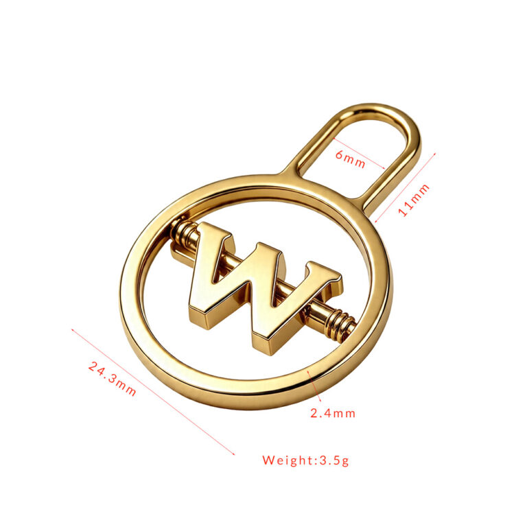 Metal logo charm with custom letter W, gold-plated round frame front view