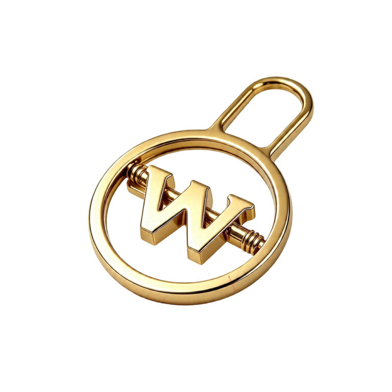 Metal logo charm with custom letter W, gold-plated round frame front view