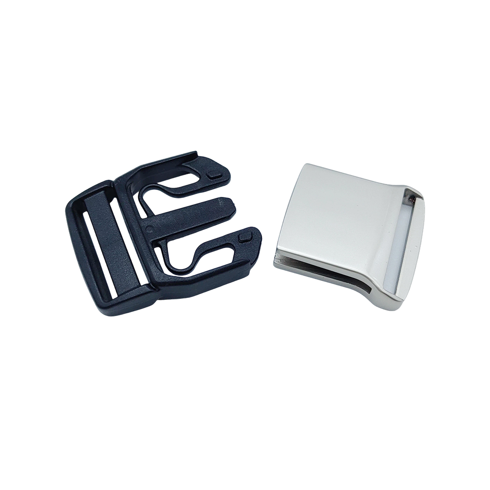 A disassembled view of a metal plate insert buckle, showing the injection molded buckle body and the snap-fit quick-release clasp.