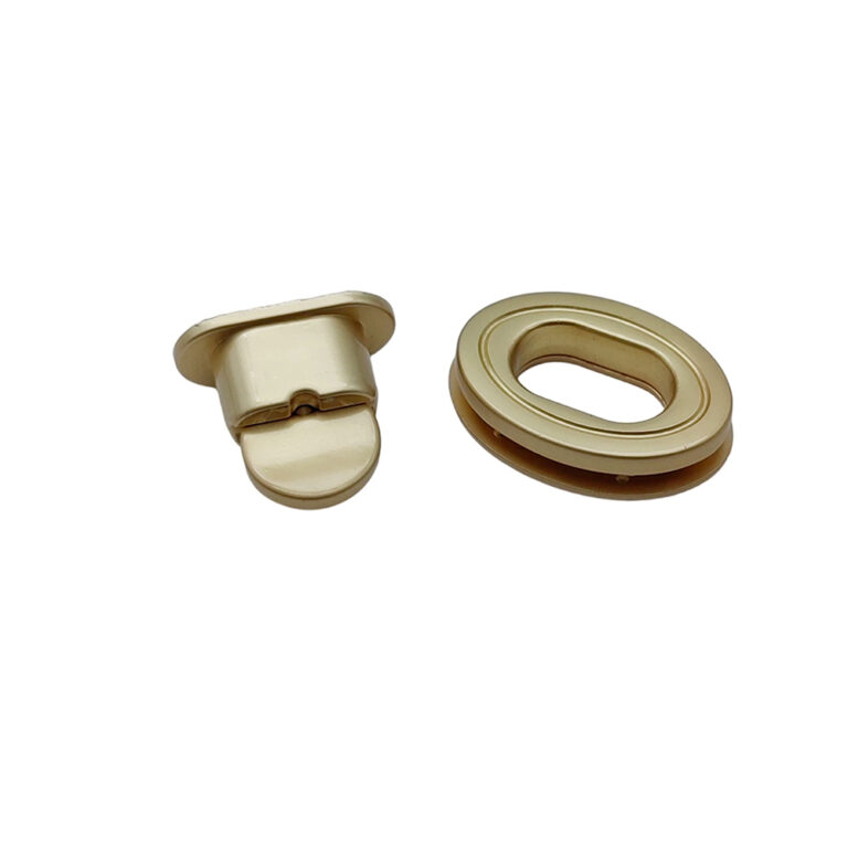 Assembled oval twist lock hardware in locked position for handbag flap closure