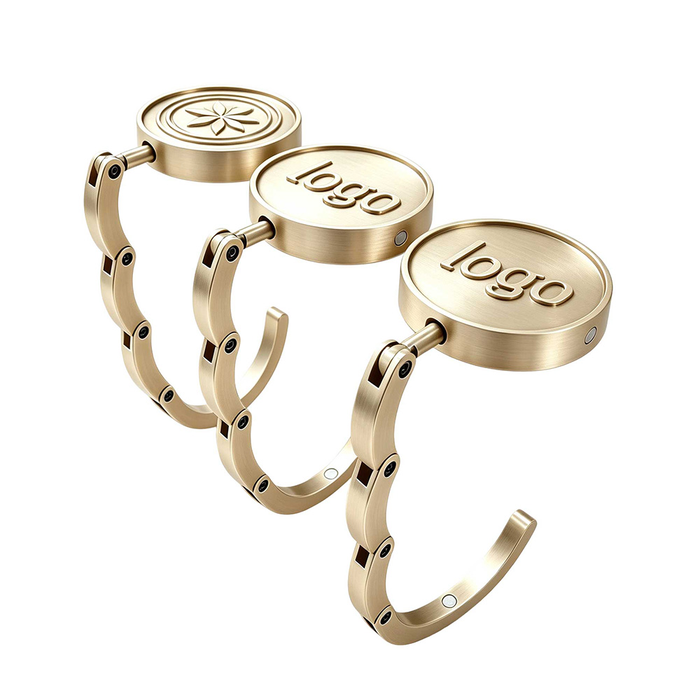 Personalized purse hook for handbags in a gold finish with a purse holder hook design.