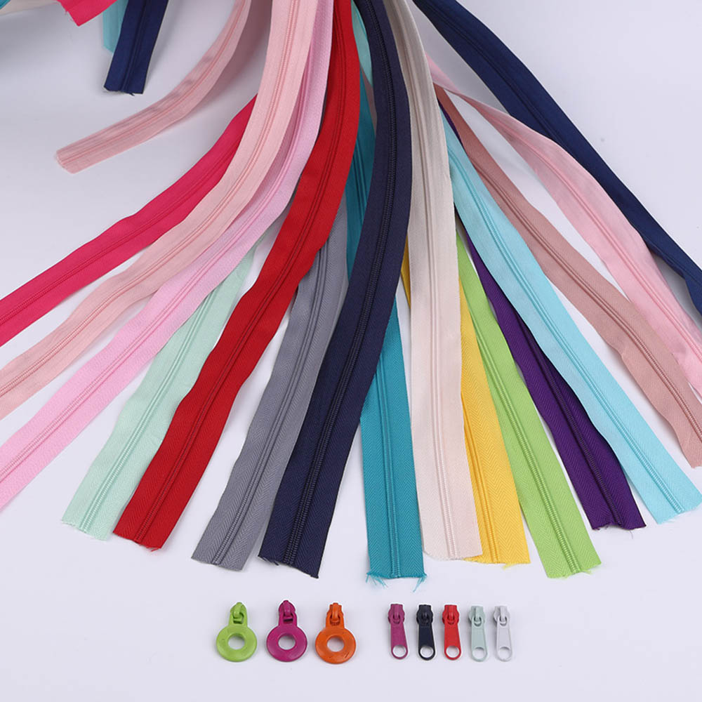 Wholesale nylon zipper tape and custom zipper pulls in various colors