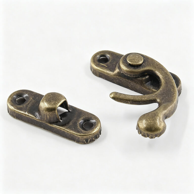 Locked antique brass handbag lock hardware and swing latch clasp on a clean white background for premium purse designs.