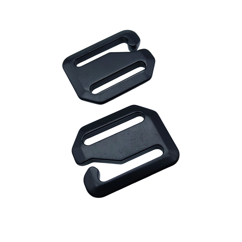 Two black custom dog hook hardware pieces with integrated webbing slots