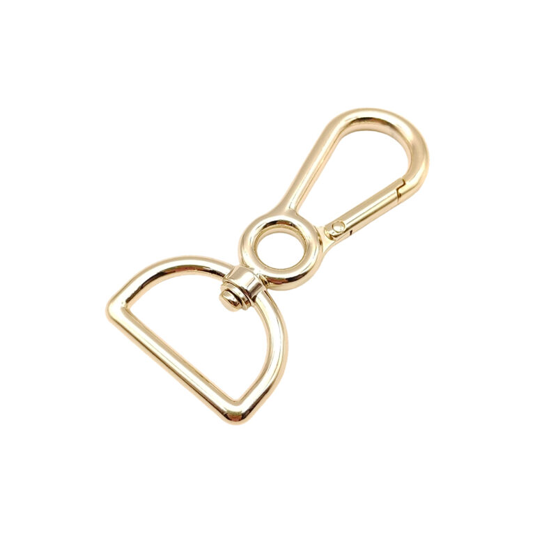 Custom swivel snap hook with center eye and D ring for luxury handbags.
