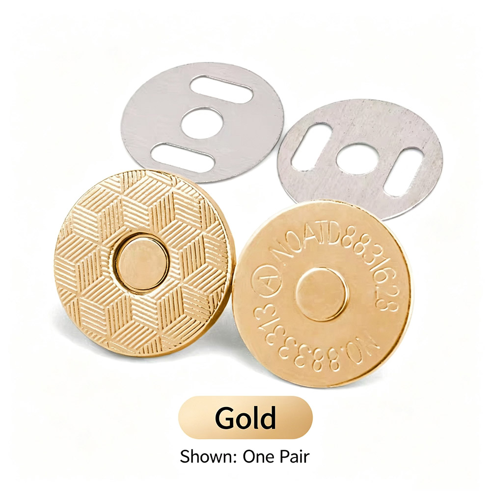 Gold magnetic snap button for handbags shown as one pair