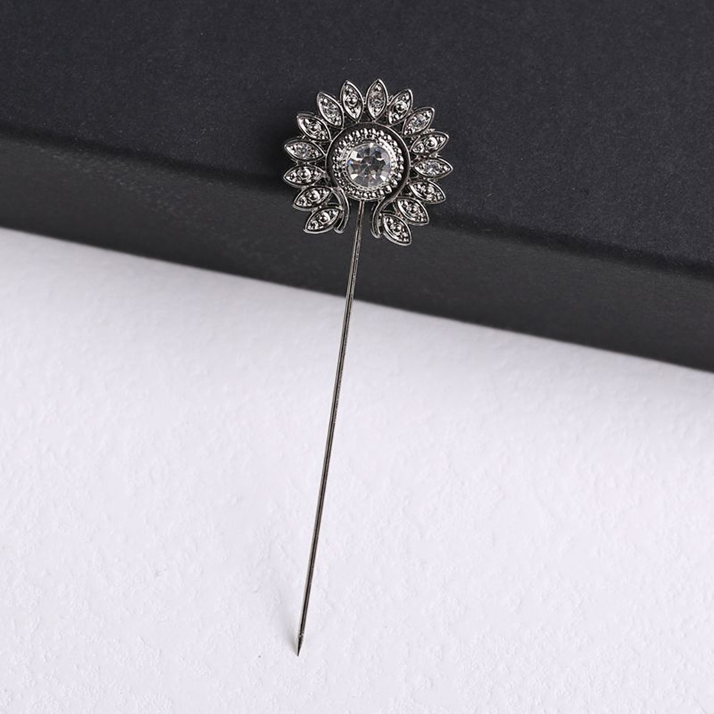 Vintage floral metal lapel stick pin with a round decorative head