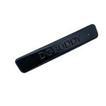 Black brushed metal nameplate with embossed lettering for handbag and bag branding