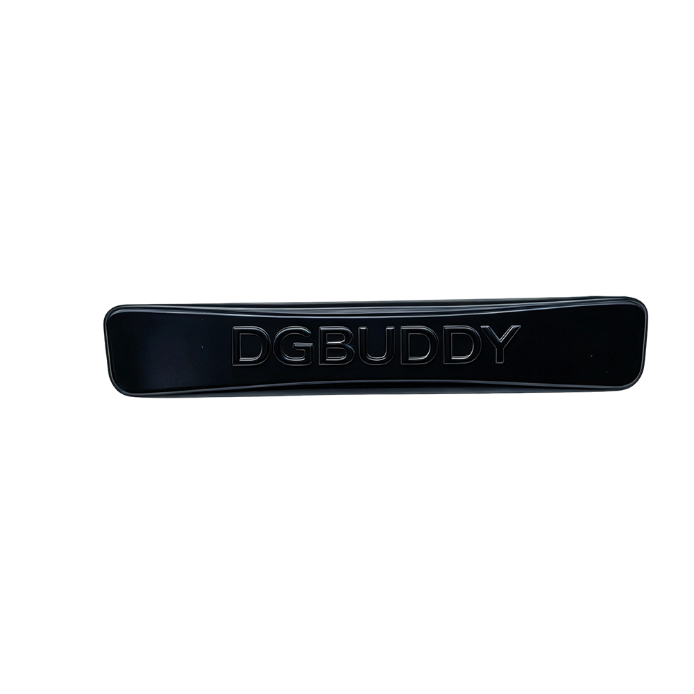 Black custom metal logo emblem for bags with embossed DGBUDDY lettering shown from the front
