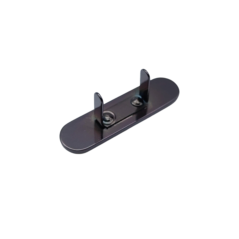 Rear view of black zinc alloy logo plate with dual pins and fixing detail