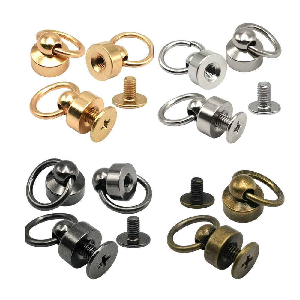 Detailed view of gold, silver and gunmetal ball post rivets with separate screws and rings