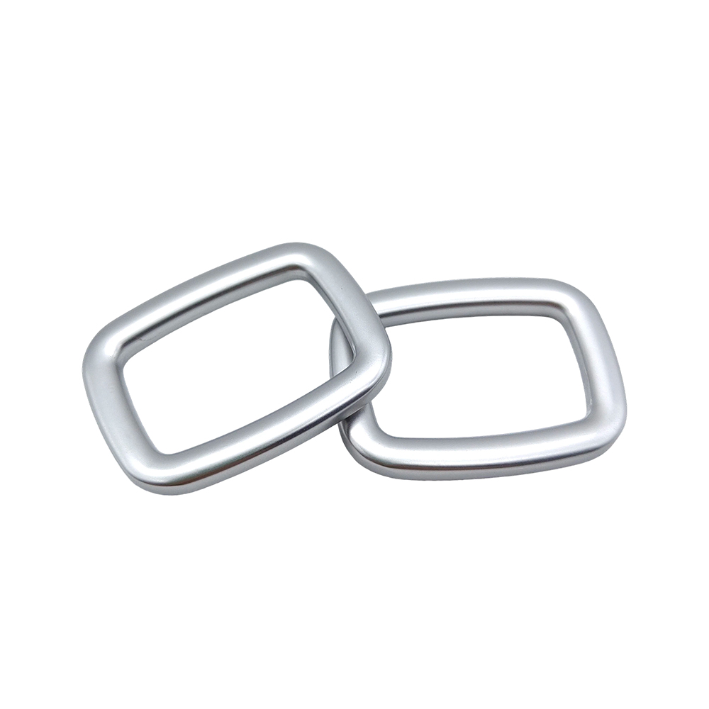 Interlocking square rings showing bag strap hardware connection
