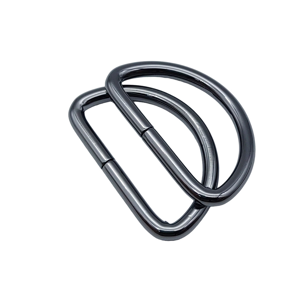 Pair of non welded d rings in gunmetal stacked to show the open seam and wire thickness
