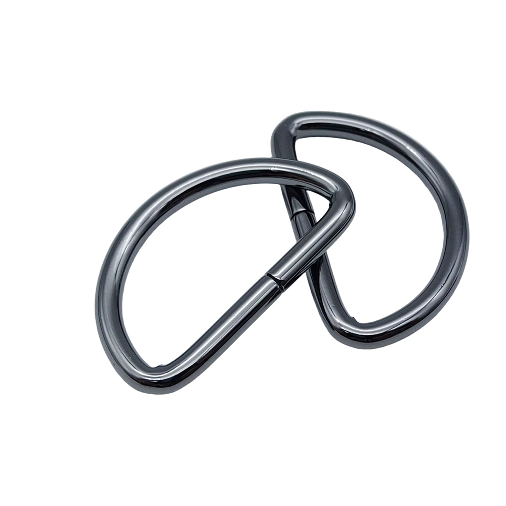 Two interlocked sewable d ring pieces in gunmetal for leather, canvas and backpack straps